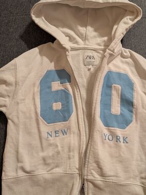 Zara Cream Hooded Zip Sweatshirt with Light Blue '60' Graphics